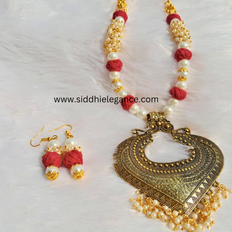 Red cotton bead pendant necklace