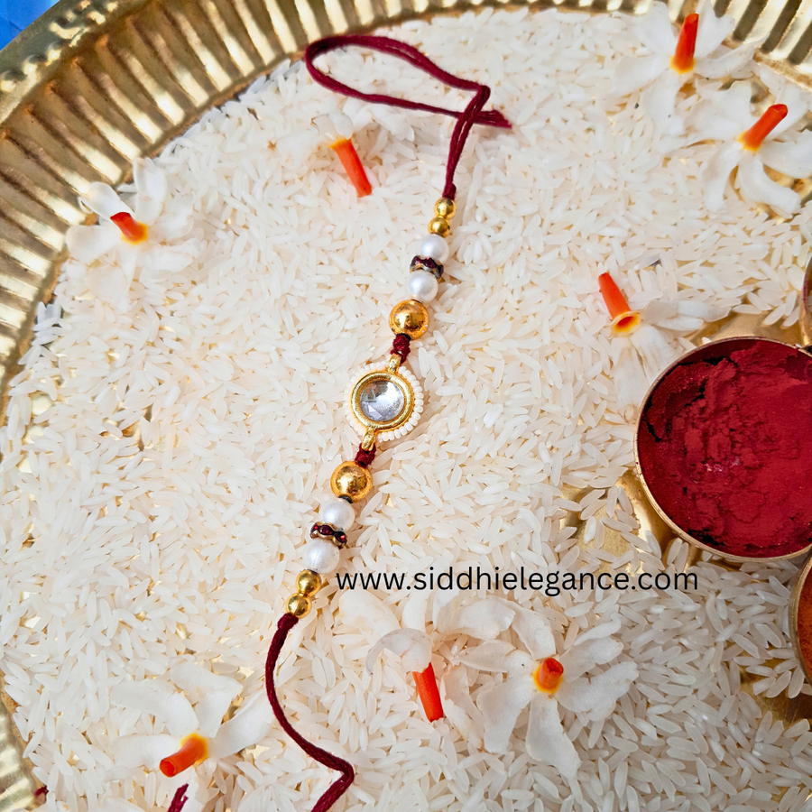 white kundan rakhi(pack of 10)